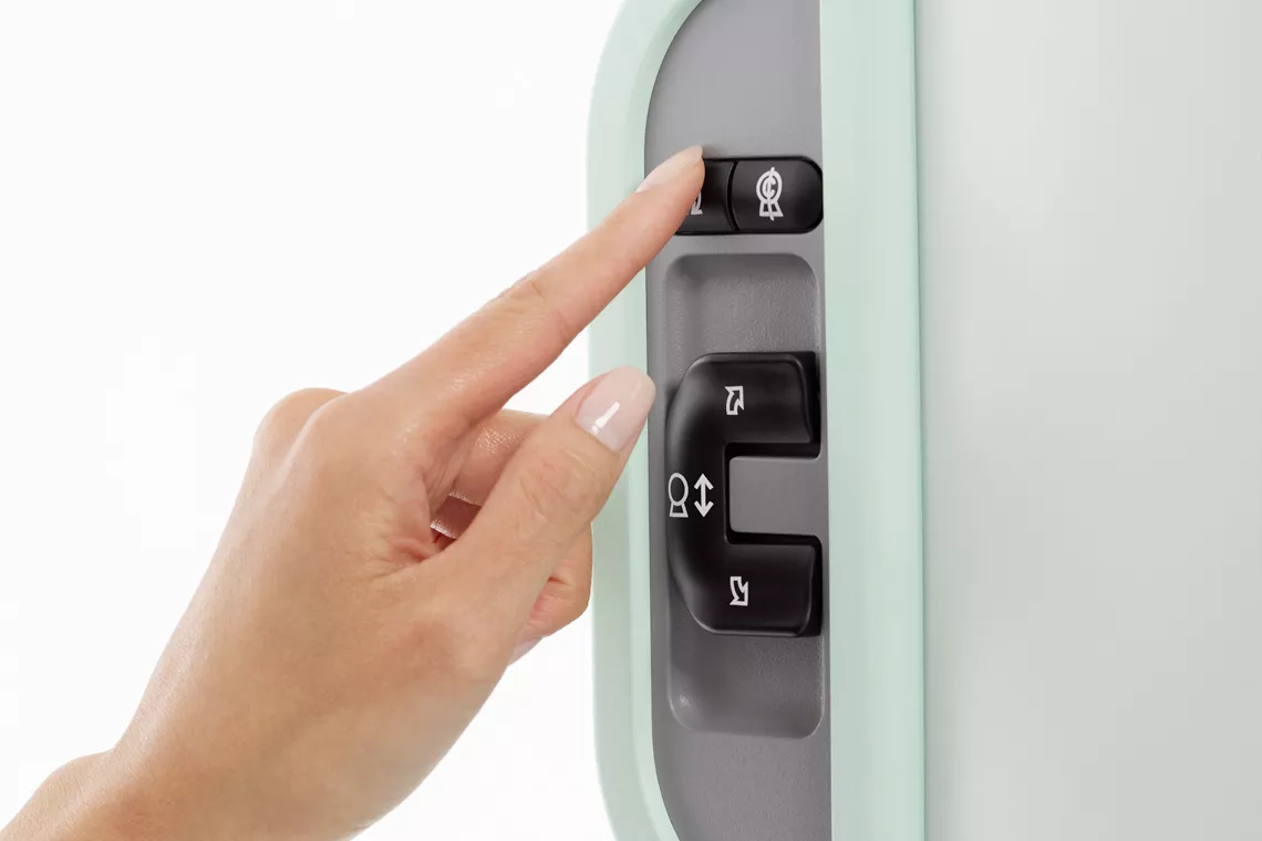 Knapper, man kan trykke manuelt på, til valg på maskinen